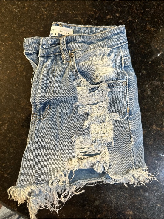 Almost Famous Pants - Almost Famous Light Blue Denim Skirt with Branded Button